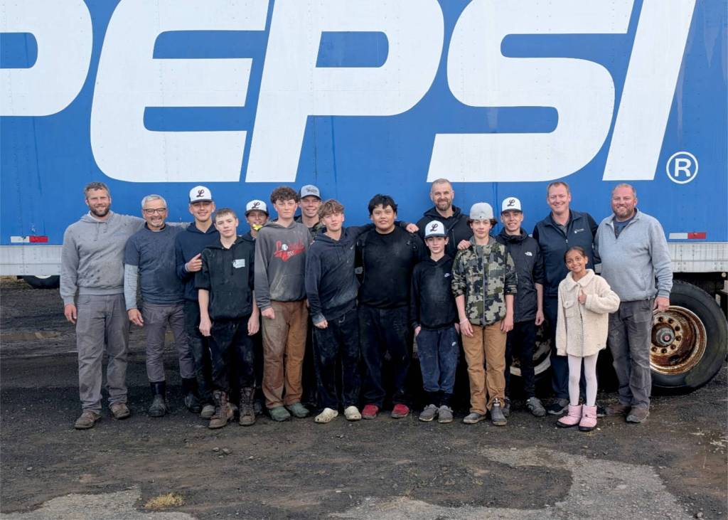 Members of the Local 155 Junior Babe Ruth team helped raised money for the team by washing a fleet of trucks belonging to Peninsula Bottling Company in Port Angeles.