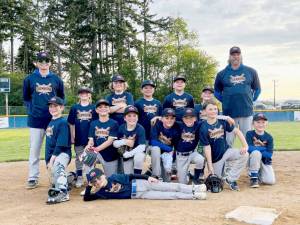 The Rotary Club team won this weekend's North Olympic Baseball and Softball baseball championship for the U12 Majors 46/60 league. From left, back row are coach Joel Wood, Skyler Neitzel, Bjorn Rose, Sawyer Almond, Gabriel Money, Joshua Shiepko and Coach Simon Money. From left, bottom row, are Gabriel Shiepko, Steven Torres, Samuel Jones, Jace Baker, August Jones, Raylan Gear and Damien Millet. Lying sideways is Reed Lancaster.