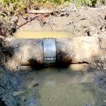 An encapsulated engineered coupler used to repair a January leak. The leak occurred along a similar welded joint near to the current leak. (City of Port Townsend)