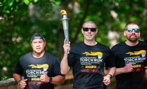 Representatives from the Peninsula Communications team and Port Angeles Police Department were among those from other Clallam County law enforcement agencies who participated in the 2025 Special Olympics Law Enforcement Torch Run. (Jesse Major)