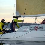 Winning team, Puget Sound Navigation Company from left to right; Anthony Boscolo, Michael Karas and Molly Karas sailing on Incognito. ( Jim Meyers)