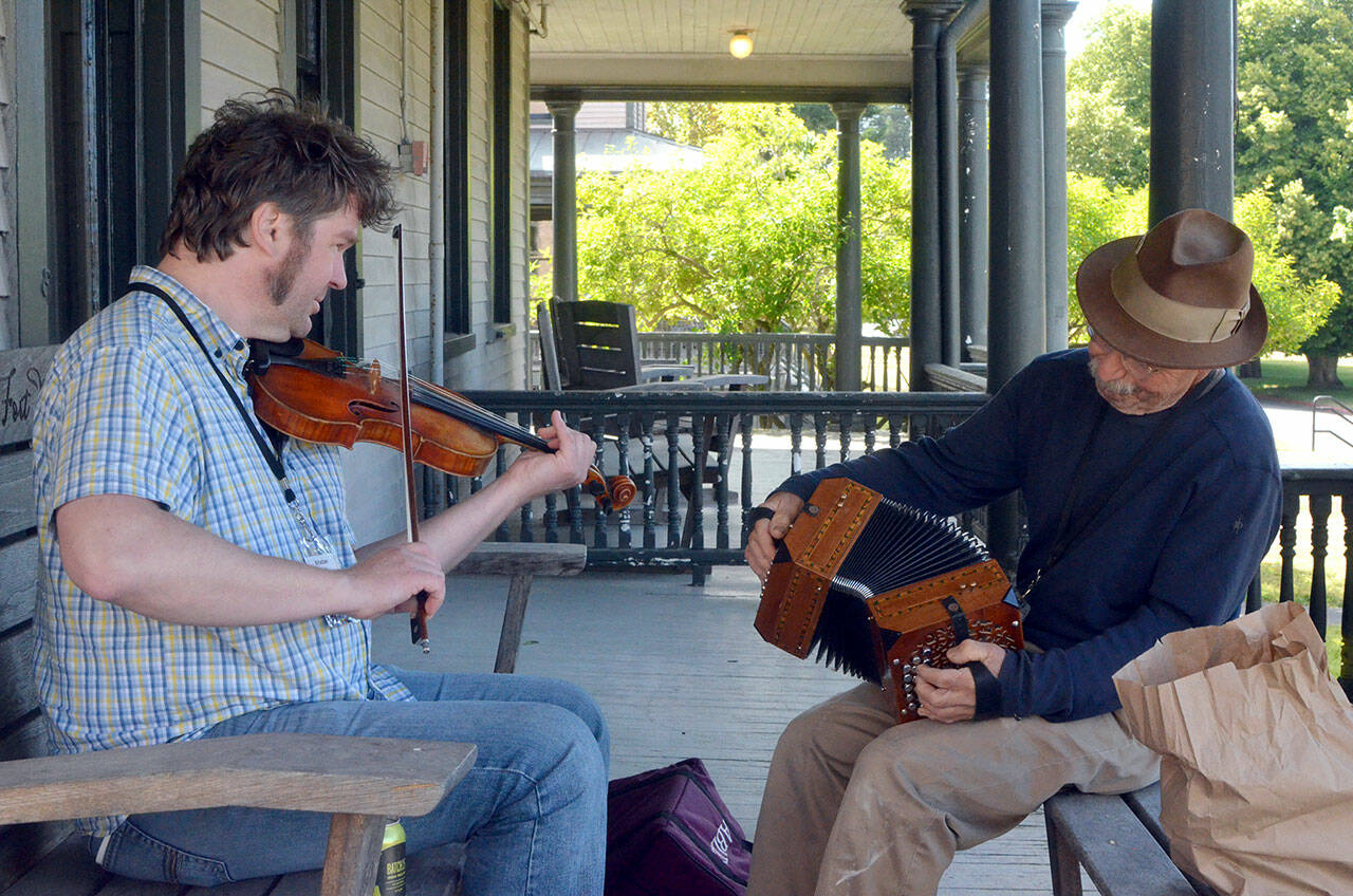 Violinist Kristian Bugge plays traditional Danish folk songs with Fiddle Tunes found Bertram Levy, July 2. (ELIJAH SUSSMAN/PENINSULA DAILY NEWS)