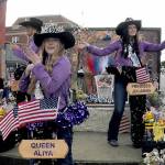 Clallam County Fair royalty, from left, Princess Keira Headrick, Queen Aliya Gillett and Princess Julianna Getzin ride on their float during Fridays parade through downtown Port Angeles. (Keith Thorpe/Peninsula Daily News)