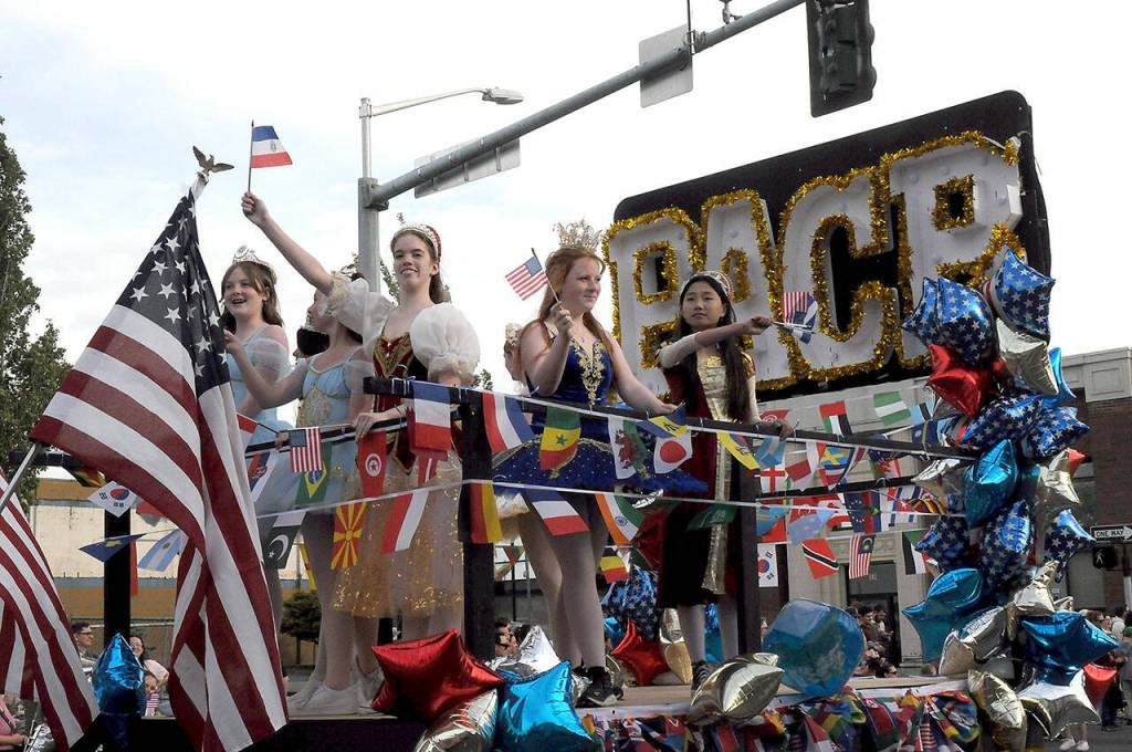 Members of the Port Angeles City Ballet Silvia Joyce Wanner School celebrate the holiday from their July 4 Parade float. (Keith Thorpe/Peninsula Daily News)