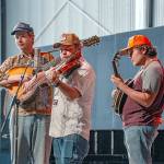 The Tennessee Hillbuddies, from left, Conner Vlietstra, Henry Barnes and Trevor Holder, perform during a concert at McCurdy Pavilion at Fort Worden State Park on Friday. (Steve Mullensky/for Peninsula Daily News)