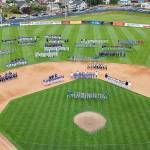 Civic Drone Courtesy Eric Johnson Teams line up on the Civic Stadium diamond for the Northwest Washington Cal Ripken State Championships opening ceremony Wednesday evening. Port Angeles is hosting the championships for the first time in 20 years. Organizers expect the event to draw between 1,500 and 2,000 visitors, including families, coaches and officials.