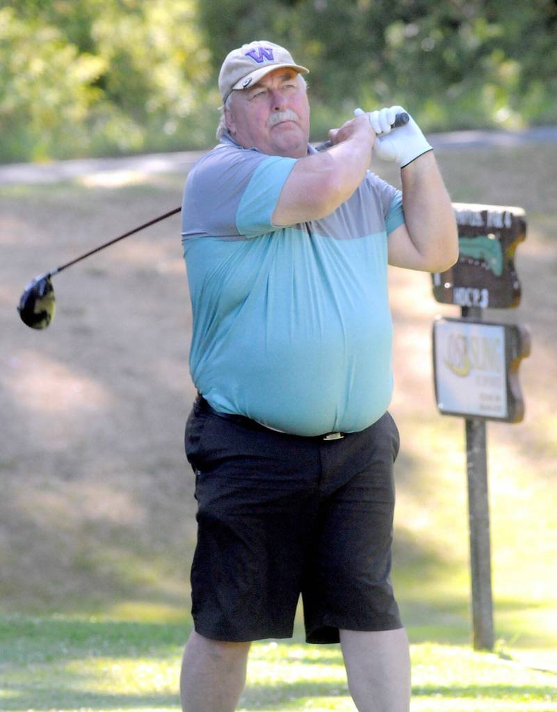 KEITH THORPE/PENINSULA DAILY NEWS Brian Sleight of SeaTac tees off during Fridays Clallam County Amateur at Peninsula Golf Club.