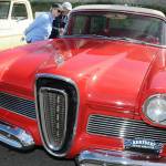 Kelly and Dan Freeman of Port Ludlow examine a 1958 Edsel on display during Friday evenings 29th annual Ruddell Cruise-In at Ruddell Auto in Port Angeles. The event featured hundreds of antique and vintage automobiles from across the region as well as food, music and other activities. (Keith Thorpe/Peninsula Daily News)