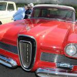 Kelly and Dan Freeman of Port Ludlow examine a 1958 Edsel on display during Friday evenings 29th annual Ruddell Cruise-In at Ruddell Auto in Port Angeles. The event featured hundreds of antique and vintage automobiles from across the region as well as food, music and other activities. (Keith Thorpe/Peninsula Daily News)