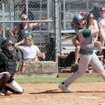 Port Angeles U11s Mason Henderson hits a RBI to right field as the local team played the Lynden Lobos in the championship game, falling 9-5. (Dave Logan/for Peninsula Daily News)