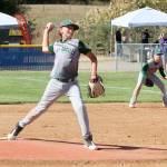 Jack Rudd pitches for the Port Angeles 12U team in a semifinal game against Wenatchee Saturday morning at the Port Angeles Baseball Complex. Grant Lancaster is the 1st baseman ready for what the hitter hits. Port Angeles beat Wenatchee 9-0 to advance to the title game.