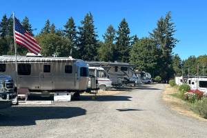 Actor John Waynes family sought to build a resort adjacent to the John Wayne Marina for several decades, but now a plan is before Sequim city staff by Seabrook Land Company to develop 600 lots on and around the John Wayne Rustic Waterfront Resort with the Wayne familys blessing, developers have said. (Matthew Nash/Olympic Peninsula News Group)