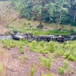 A tanker truck overturned into Indian Creek west of Port Angeles, according to the State Patrol and the state Department of Transportation. U.S. Highway 101 was closed Friday afternoon at milepost 238 near Herrick Road, and traffic was being diverted to state Highway 112. (Katherine Weatherwax via X)