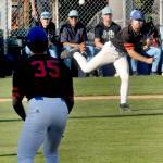 Lefties pitcher Garrett Patteron, right, tosses the ball to first baseman Danny Porras after stopping a short hopper by Bellinghams Gavin Long for an out on Wednesday at Port Angeles Civic Field. (Keith Thorpe/Peninsula Daily News)