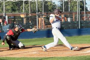 Dave Logan/for Peninsula Daily News
Lefties WCL All-Star Tommy Markey swings at pitch against the Wenatchee AppleSox at Civic Field on Monday. Markey had a single and run scored in the Lefties' 5-2 loss.