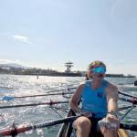 The A final of the coxed quad of the Port Angeles coastal beach sprint regatta pitted the Pocock Rowing Club team of Logan Fink (foreground), Randall Sigle, Hank Koerner, Rachel Egner and Seamin Kim against the Green Lake team of Georgia Legere, Emily Gascho, Christine Legere, Natalie Lecher and Jeff Pozarski. Pocock won with a time of 3:50.2. The teams are seen completing the 180 degree turn 250 meters from shore. (OPRA)