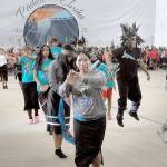Members of the Cheam First Nation of Rosedale, British Columbia, perform a canoe dance during Fridays first full day of dancing and protocols for visiting native groups to Paddle to Elwha 2025 on the Lower Elwha Klallam reservation west of Port Angeles. Native bands from across the region are taking part in the event, which will continue through Tuesday. (Keith Thorpe/Peninsula Daily News)