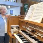 Matthew Nash/Olympic Peninsula News Group
Pat Marcy stands by the organ in Faith Lutheran Church that shes played since it was built in 1991. This summer marks her 50th year leading music at the church, and with her retirement, a new director of parish music started on Aug. 3.