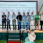 The 7th annual Port Angeles Hall of Fame induction ceremony was held Saturday night on the grass at Civic Field. More than 350 people attended the event held under a tent. Nine individuals were inducted as well as three teams — the 1977 girls basketball, 1972 football, and 1952 boys basketball teams. The nine individuals were Bob Blackburn, track; Mike Chamberlin, swimming; Gus Kravas, basketball; Steve Johansen, basketball; Jodie Jones, softball; Bob Lovell, football; Adam Macomber, football; Bob Spencer, swimming; and Susan Wilson Childers, badminton. Here, Jerry Payne, far left, speaks for the 1972 football team that was ranked as high as fifth in the state and had seven shutouts in 10 games. (Photos by Dave Logan/for Peninsula Daily News)