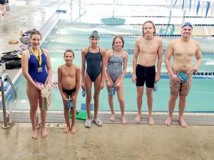 Members of the Port Angeles Swim Club competed in the Pacific Northwest Swimming Long Course Championships in Federal Way earlier this month. From left are Abby Zajkowski, Kai Hapoff, Kenzie Hapoff, Annechie Ridle, Adam Kaminski and Thomas Jones. (Port Angeles Swim Club)