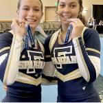 Forks cheerleaders Libby Owen and Danikka King have to been selected to perform at the Pearl Harbor Memorial Parade in Oahu in December and are raising funds for the trip.