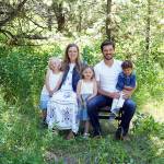 New Port Angeles High School assistant principal and athletic director Jarom Packer is pictured with his wife Merrin and three children.