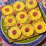 Pineapple Upside Down Cake by Virginia Ashby is among the award winners in the new Potluck Banquet show at Northwind Arts gallery in Port Townsend. The venue will be part of Art Walk this Saturday, while the show will stay on view through Oct. 13. (Northwind Art)