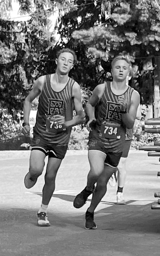 Port Angeles Cross Country
Port Angeles runners Henry Wendell and Justin McClarty run during the Olympic League Cross Country Jamboree at Kitsap County Fairgrounds on Wednesday.