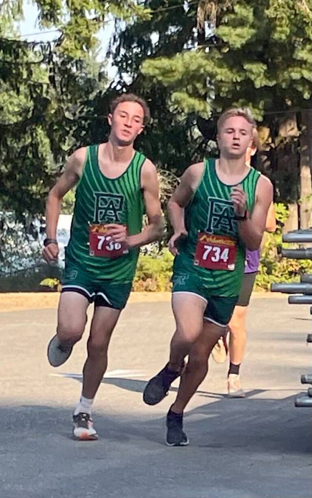 Port Angeles Cross Country 
Port Angeles runners Henry Wendell and Justin McClarty run during the Olympic League Cross Country Jamboree on Wednesday.