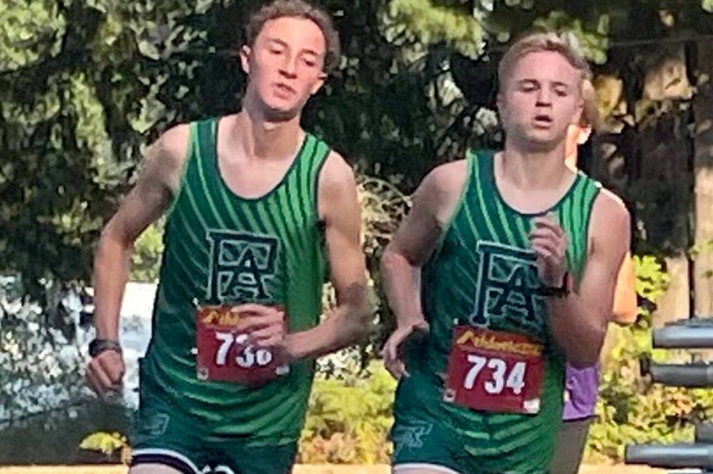 Port Angeles Cross Country
Port Angeles runners Henry Wendell and Justin McClarty run during the Olympic League Cross Country Jamboree at Kitsap County Fairgrounds on Wednesday.