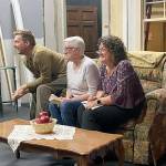 Port Angeles residents, from left, Justin Stapleton, Mary Kaye O'Brien and Jenifer Saul rehearse on the unfinished set of "The Foreigner."