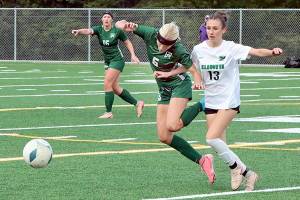 Dave Logan/for Peninsula Daily News
Port Angeles' Pyper Alton (6) battles Klahowya's Sylvia Kemp for the ball Monday at the Monroe Playfield. In the background is Port Angeles' Alayna Marazon (16). Port Angeles won 2-1 on a late goal by Mariah Traband.