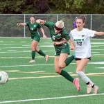 Dave Logan/for Peninsula Daily News Port Angeles Pyper Alton (6) battles Klahowyas Sylvia Kemp for the ball Monday at the Monroe Playfield. In the background is Port Angeles Alayna Marazon (16). Port Angeles won 2-1 on a late goal by Mariah Traband.