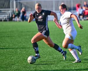 Jay Cline/Peninsula College Athletics 
Peninsulas Grace Widergren, right, chases down a ball while attempting to hold off Skagit Valleys Paige Mason during Wednesdays contest at Wally Sigmar Field. Mason is a 2024 Port Angeles High School graduate and former Roughriders soccer standout. The top-ranked Peninsula Pirates womens soccer team snapped its 10-game home winning streak at Wally Sigmar Field with a 1-1 draw against Skagit Valley on Wednesday. 
Shiori Shintaku scored an unassisted goal in the 14th minute, but the Cardinals equalized early in the second half and held off Peninsula despite the Pirates 29-5 edge in shots and 9–0 advantage in corner kicks. 
Peninsulas unbeaten and untied streak dated back to a 0-0 draw with Skagit Valley on Sept. 27, 2023.