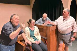 Matthew Nash / Olympic Peninsula News Group
Inherit the Wind actors, from left, Ron Graham, as Matthew Harrison Brady, Nikki Forrest, as Rachel Brown, Joe Schulz, as the judge, and Steve Rodeman, as Henry Drummond, rehearse a scene in Olympic Theatre Arts upcoming production set for Sept. 12-28 in the Gathering Hall.