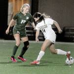 KEITH THORPE/PENINSULA DAILY NEWS
Port Angeles' Teanna Clark, left, is ready to pounce as Bainbridge's Isabella Saint Clair looses control of the ball on Tuesday at Peninsula College.