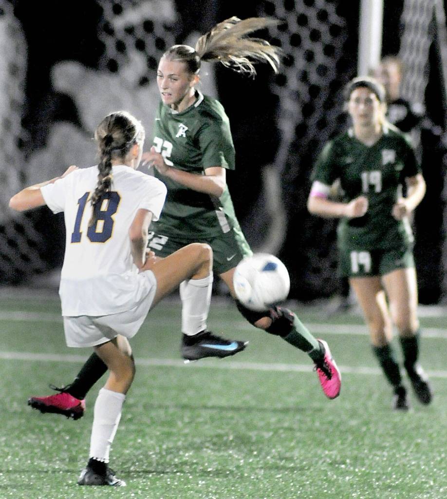 Port Angeles Teanna Clark, center, cuts off Bainbridges Vega Hendrickson, left, as teammate Becca Manson moves toward the ball on Tuesday at Wally Sigmar Field. (Keith Thorpe/Peninsula Daily News)