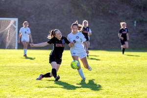 Steve Mullensky/for Peninsula Daily News

Rivals Fern French challenges Life Christian's Lucia Roso for control during the first half of a game played on Thursday at Port Townsend's Memorial Field.