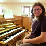 Jacques Star/Olympic Peninsula News Group
Ryan Edinger sits at the organ he now commands at Faith Lutheran Church in Sequim. There are 10 ranks of pipes, each with 61 notes, including flats and sharps.