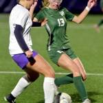 KEITH THORPE/PENINSULA DAILY NEWS
Sequim's (#21), left, battles for ball control with Port Angeles' Brooke Pierce on Thursday evening in Port Angeles.