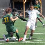 KEITH THORPE/PENINSULA DAILY NEWS Peninsulas Austin Collins, right, interrupts the pass between Shorelines Taiga Sannomiya, left, and Adjinon Alowakinnou on Saturday at Wally Sigmar Field.
