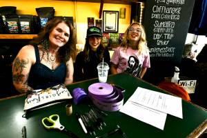 Jennifer Hanshaw, left, her daughter Ember, center, and friend Skyler Adair enjoy cream sodas during a fundraiser for the Hanshaw family at Rainshadow Cafe on Sept. 27. 
Jacque Star/Olympic 
Peninsula News Group