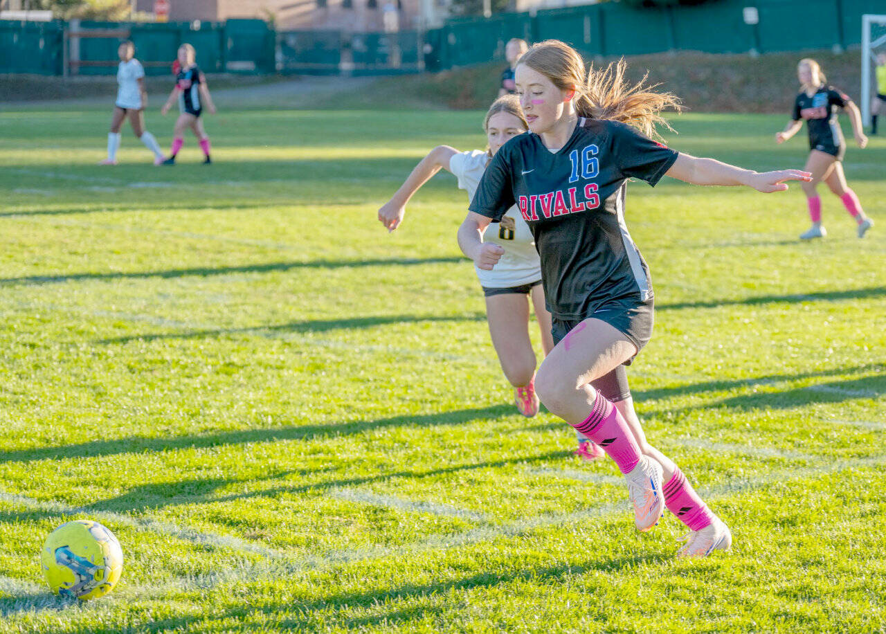 East Jeffersons Fern French controls the ball and moves it downfield during a Nisqually League game played against the Vashon Pirates on Tuesday in Port Townsend. (Steve Mullensky/for Peninsula Daily News)