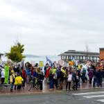 No Kings Rally goers march along Water Street in downtown Port Townsend on Saturday. (Steve Mullensky/for Peninsula Daily News)