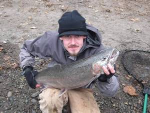 Nate Treat holds up a hatchery steelhead caught while fishing on the Bogachiel River near Forks. The Quillayute, Bogachiel and Calawah rivers will have a two hatchery steelhead limit through Feb. 28. The Hoh River also will have a two-hatchery steelhead limit through Feb. 15.