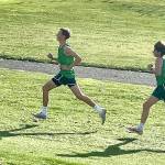 Port Angeles Henry Wendel and Jay Lieberman in the state 2A cross-country race at Sun Willows Golf Course in Pasco. (Angie Gooding)
