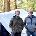 Aaron Speer, left, a former resident of the DSHS encampment and Jefferson Healthcare hospital commissioner Matt Ready both received trespass warnings from the former encampment on Nov. 4. (Elijah Sussman/Peninsula Daily News)