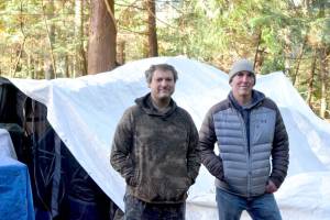 Aaron Speer, left, a former resident of the DSHS encampment and Jefferson Healthcare hospital commissioner Matt Ready both received trespass warnings from the former encampment on Nov. 4. (Elijah Sussman/Peninsula Daily News)