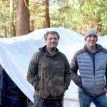 Aaron Speer, left, a former resident of the DSHS encampment and Jefferson Healthcare hospital commissioner Matt Ready both received trespass warnings from the former encampment on Nov. 4. (Elijah Sussman/Peninsula Daily News)