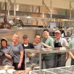 Garden Row Cafe staff in Jefferson Healthcares newly built kitchen, from the left: Aurora Kingslight, Shelly Perry, Aimee Smith, Michelle Poore, Teresa Schmidt, Jimmy Snyder, Arran Stark and Nick Collier. (Elijah Sussman/Peninsula Daily News)